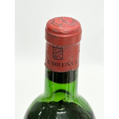 568 - A bottle of 1969 Chateau Lestage wine.