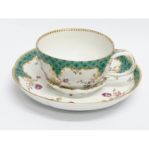 18 - A 19th Century Meissen porcelain cup and saucer.