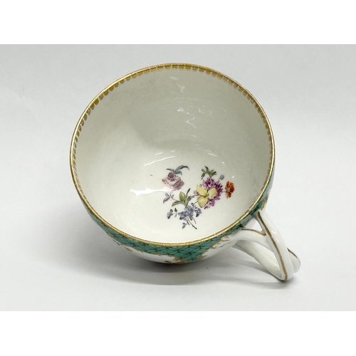 18 - A 19th Century Meissen porcelain cup and saucer.