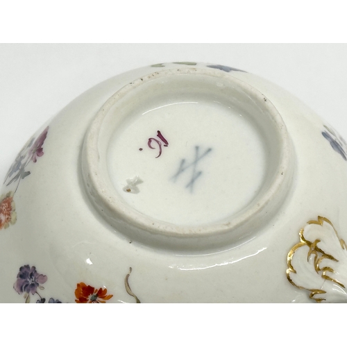 18 - A 19th Century Meissen porcelain cup and saucer.