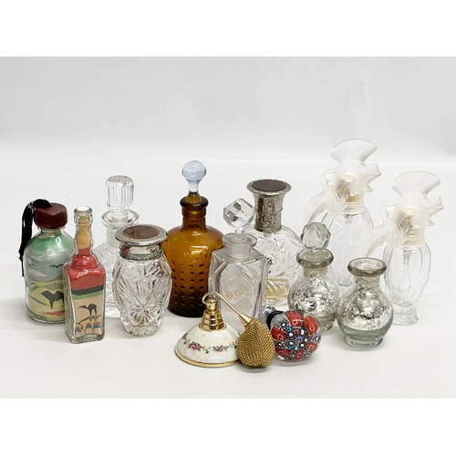 560 - A collection of vintage perfumes bottles etc.