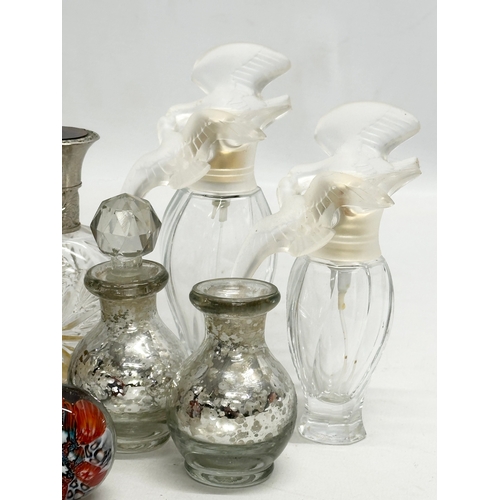 560 - A collection of vintage perfumes bottles etc.