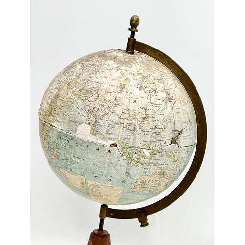 176 - An Early 20th Century Terrestrial Globe. Made in France. 54cm