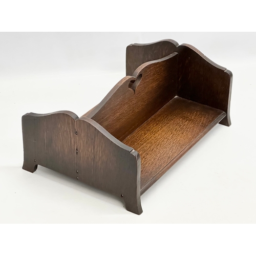 659 - An Early 20th Century oak book trough. 39x28x17cm.