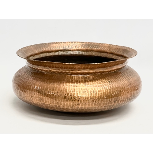 184 - A large 19th Century Middle Eastern copper jardiniere/planter. 30x13cm.