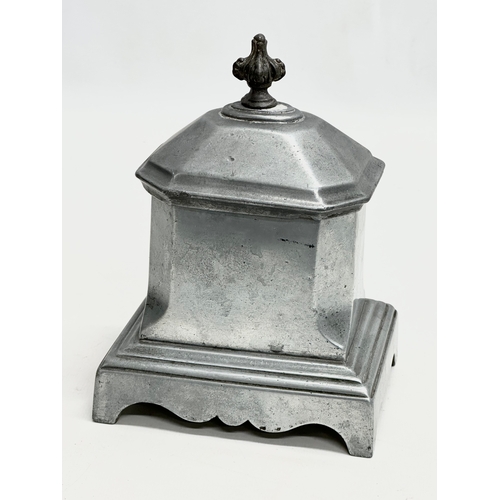 117 - A 19th Century lead tobacco jar/tea caddy. 12.5x9.5x18cm.