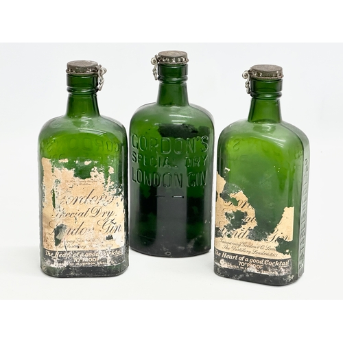 512 - Three 1920’s Gordon’s Special Dry London Gin bottles. 19cm