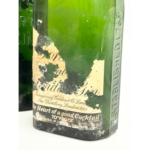 512 - Three 1920’s Gordon’s Special Dry London Gin bottles. 19cm