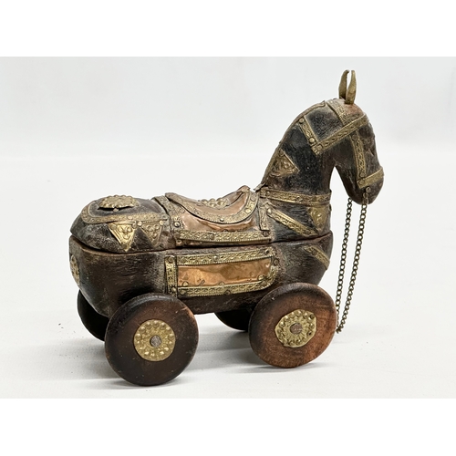 211 - An Early/Mid 20th Century Indian wooden horse trinket box. 15x13cm.