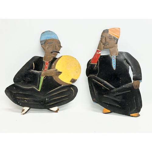 217 - A set of 5 Early/Mid 20th Century Afghan tin wall plaque musicians. 26x30cm. 38cm