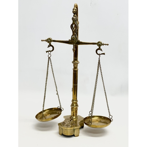 214 - Late 19th/Early 20th Century brass justice scales. 41cm