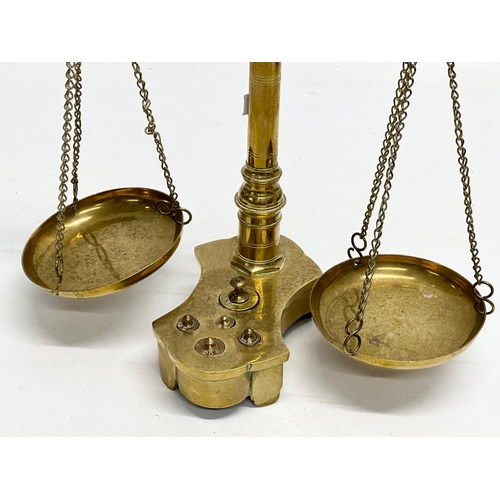 214 - Late 19th/Early 20th Century brass justice scales. 41cm