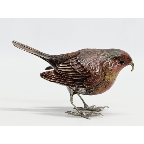 236 - A signed Robin sculpture with brass beak and silver feet. 13x8.5cm.