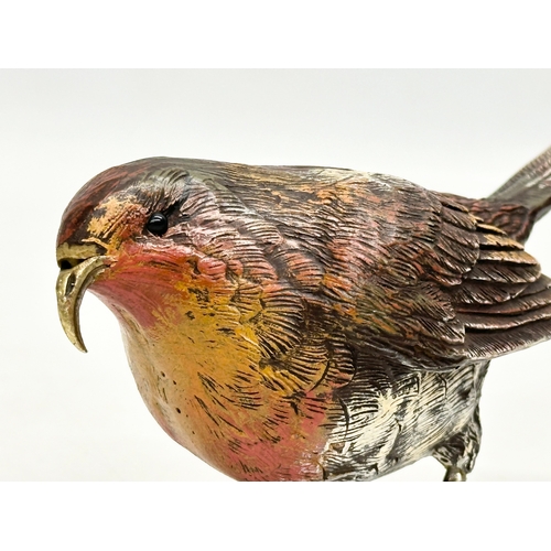 236 - A signed Robin sculpture with brass beak and silver feet. 13x8.5cm.