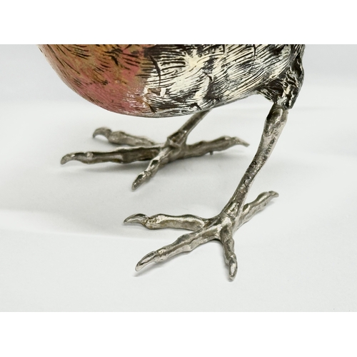 236 - A signed Robin sculpture with brass beak and silver feet. 13x8.5cm.