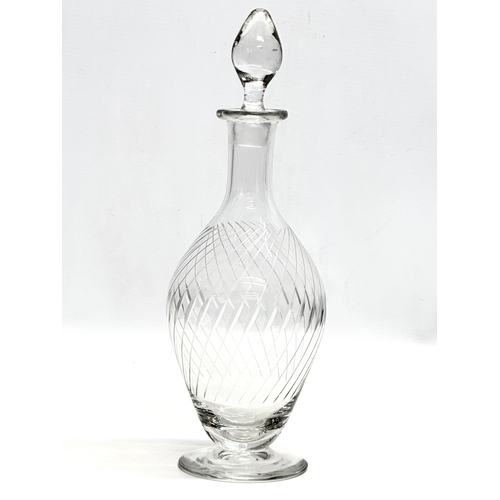 572 - Rowland Ward. A fine quality etched wrythen glass decanter, unidentified. Together with a Rowland Wa... 