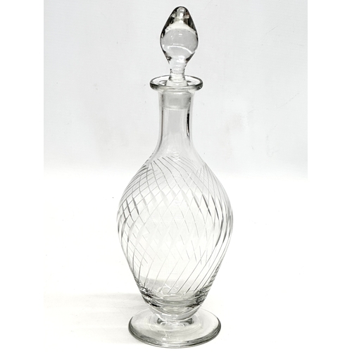 572 - Rowland Ward. A fine quality etched wrythen glass decanter, unidentified. Together with a Rowland Wa... 