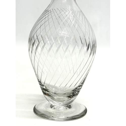 572 - Rowland Ward. A fine quality etched wrythen glass decanter, unidentified. Together with a Rowland Wa... 