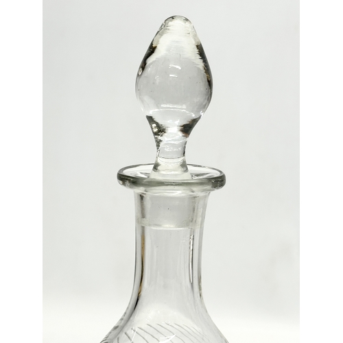 572 - Rowland Ward. A fine quality etched wrythen glass decanter, unidentified. Together with a Rowland Wa... 