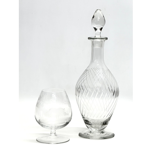 572 - Rowland Ward. A fine quality etched wrythen glass decanter, unidentified. Together with a Rowland Wa... 