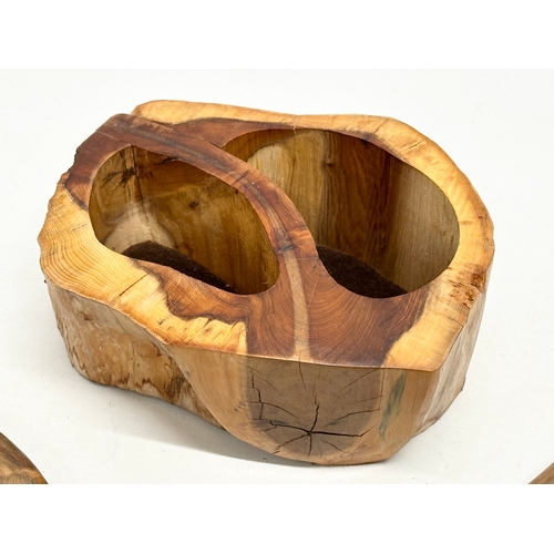 612 - A carved yew wood tree stump trinket box. 22x17x10cm