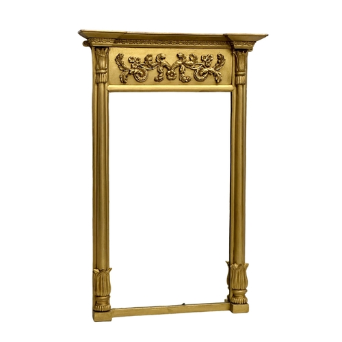 264 - An Early 19th Century Regency gilt framed pier mirror. 63x96cm