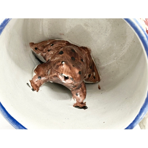 603 - A 19th Century Victorian Staffordshire Pottery frog tankard. 15x12x12cm.