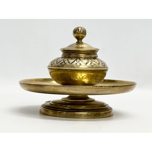 362 - A large Late 19th Century brass inkwell. 18x15cm