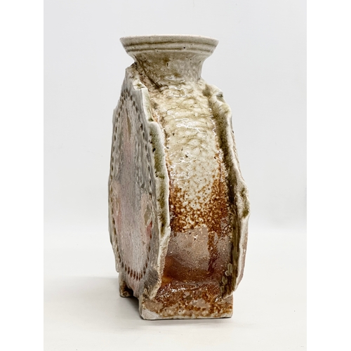 391 - A signed Mid 20th Century Japanese Shigaraki glazed bottle style vase. 23x8x24cm.