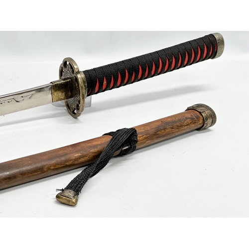 638 - A large Japanese samurai style sword. 91cm