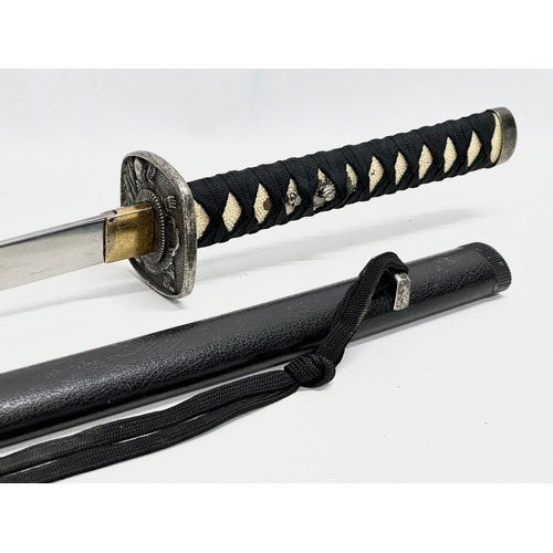 639 - A large Japanese samurai style sword. 93cm