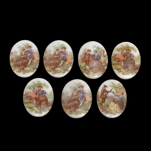 237 - Fragonard. 7 French porcelain brooch panels. All signed Fragonard. 3x4cm