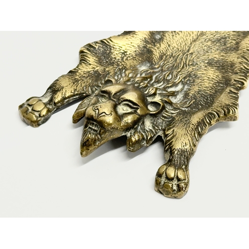 240 - A Late 19th Century brass lion rug desktop pen dish. 19cm