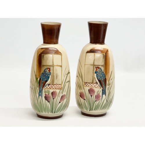 615 - A pair of Late 19th Century hand painted opaline glass vases. 22cm