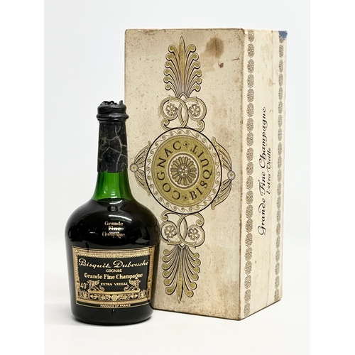 574 - A bottle of Bisquit Dubouche Cognac. Grande Fine Champagne. Extra Vielle. With original box.