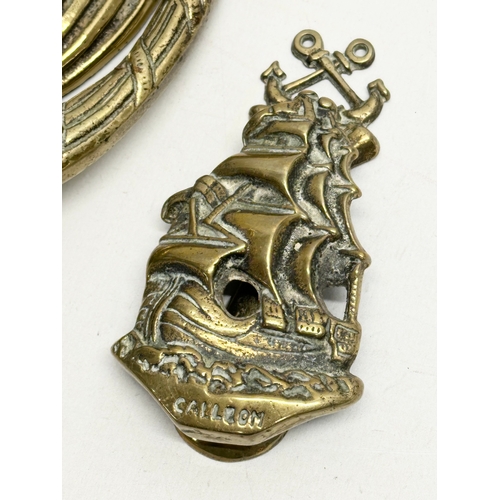 620 - Victorian brassware. A Late 19th Century brass door knocker 21cm. A small Galleon style door knocker... 