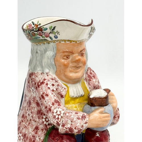 623 - A 19th Century English pottery toby jug. Probably Copeland Spode. 16x11x19cm.