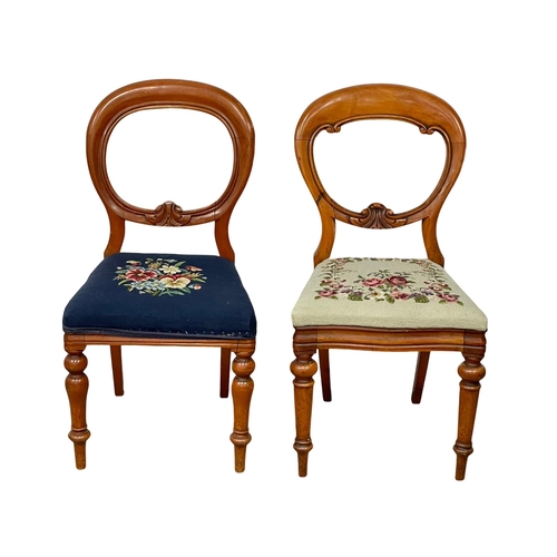 800 - A set of 4 Victorian balloon back chairs with tapestry seats.