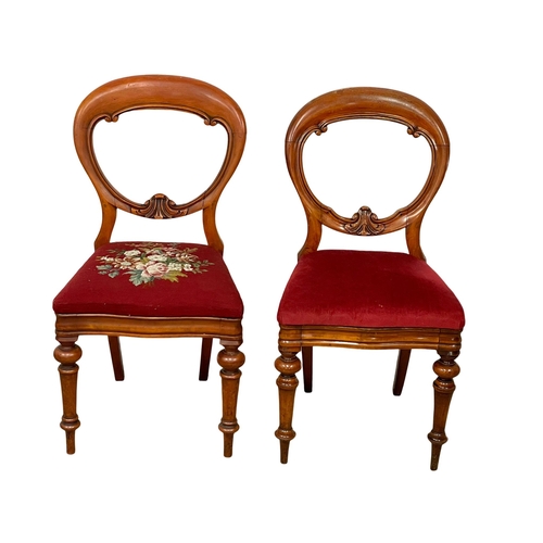 800 - A set of 4 Victorian balloon back chairs with tapestry seats.