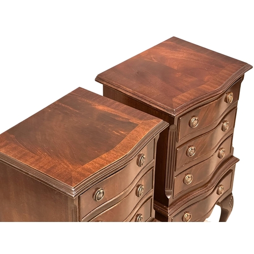 371 - A pair of Georgian style inlaid mahogany serpentine front side chests of drawers on Queen Anne legs.... 