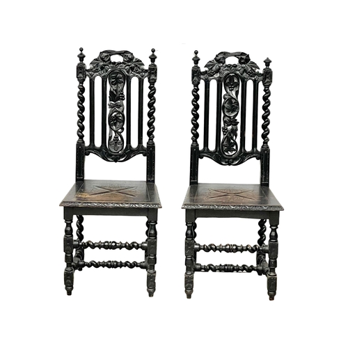 374 - A pair of late 19th century Jacobean style carved oak side chairs. 3