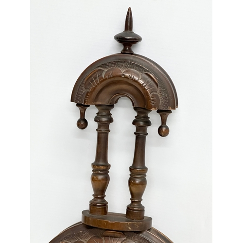 702 - A Late 19th Century Victorian wall barometer. 41cm