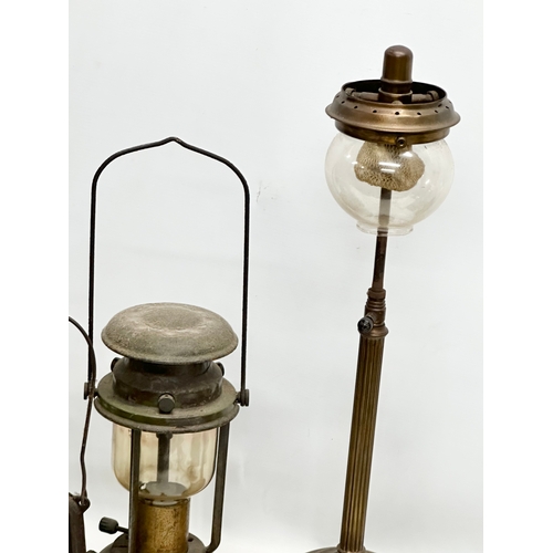 634 - A large Tilley 106 lamp. Together with another Tilley lamp and others.