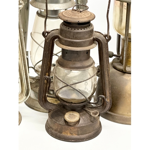 634 - A large Tilley 106 lamp. Together with another Tilley lamp and others.