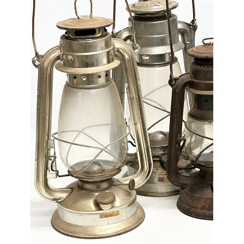 634 - A large Tilley 106 lamp. Together with another Tilley lamp and others.