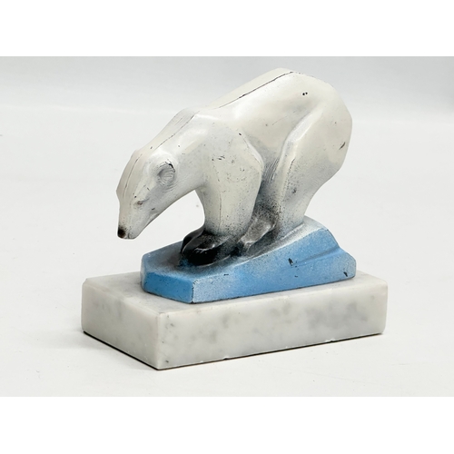 245 - A 1930’s Art Deco painted chrome polar bear sculpture, on marble base. 11x5x10cm.