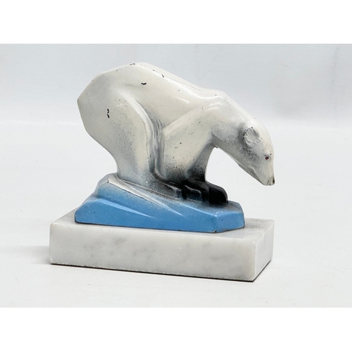 245 - A 1930’s Art Deco painted chrome polar bear sculpture, on marble base. 11x5x10cm.