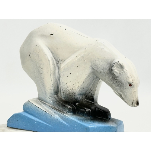 245 - A 1930’s Art Deco painted chrome polar bear sculpture, on marble base. 11x5x10cm.