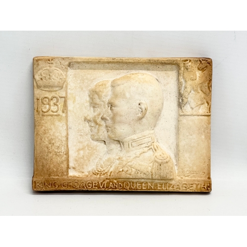 258 - A signed plaster Commemorative wall plaque. King George VI and Queen Elizabeth. 16.5x12.5cm.