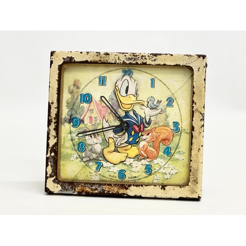 502 - A 1940’s Walt Disney Donald Duck mantle clock. Glen Clock. Made in Scotland. 14x5x13cm.